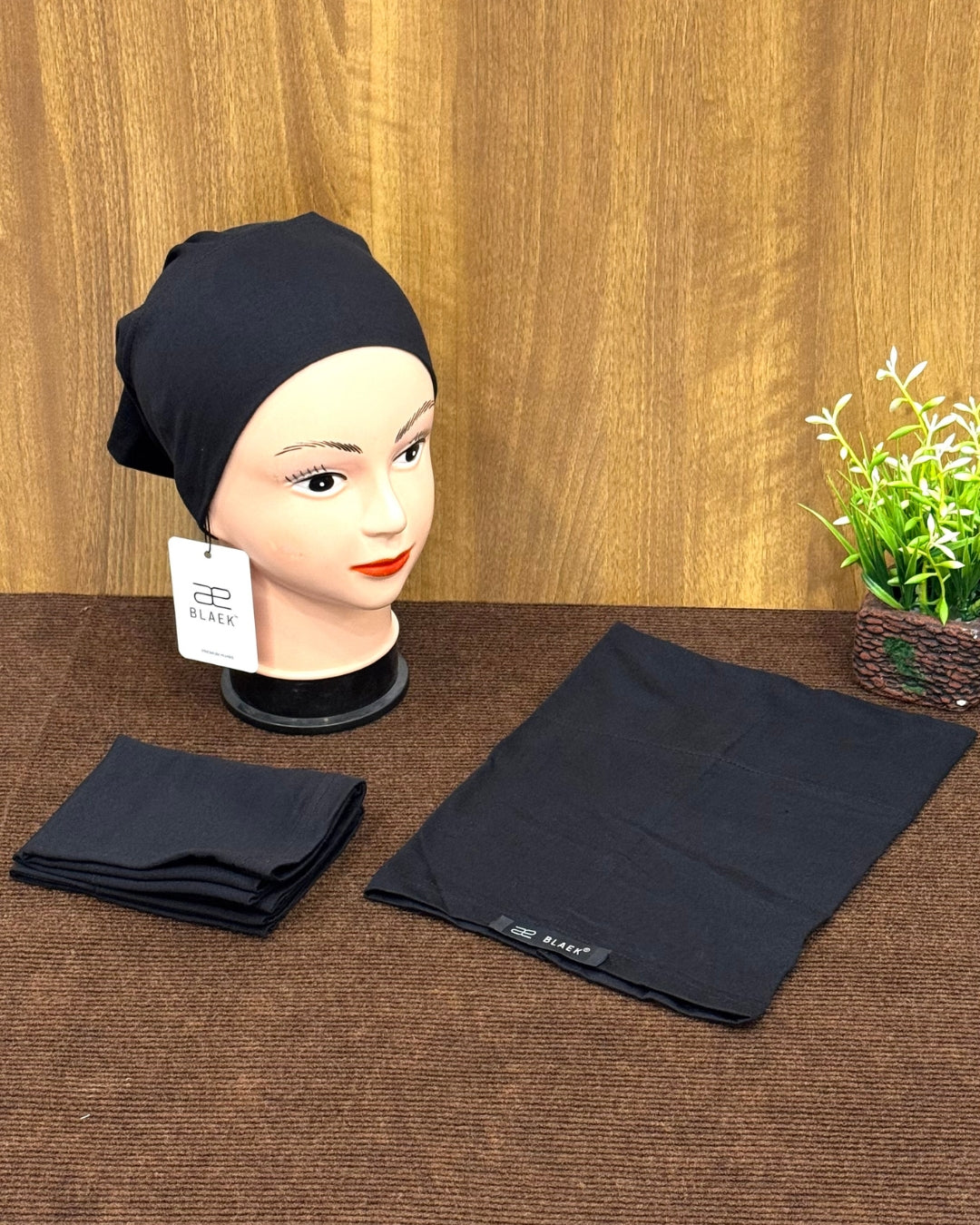 Breathable and stretchable black tube cap.