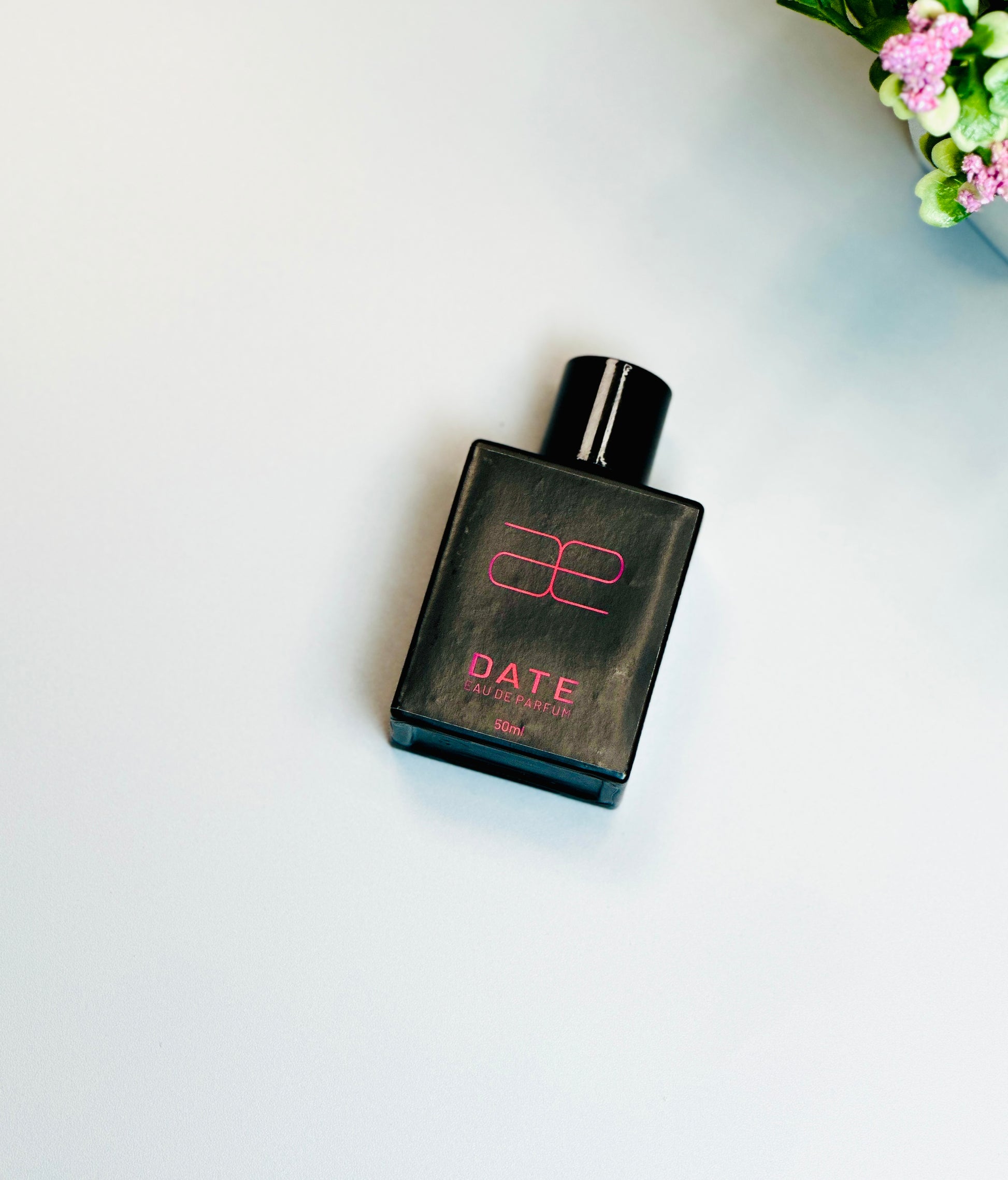 Blaek Date perfume: a blend of elegance and fragrance in a stylish bottle.