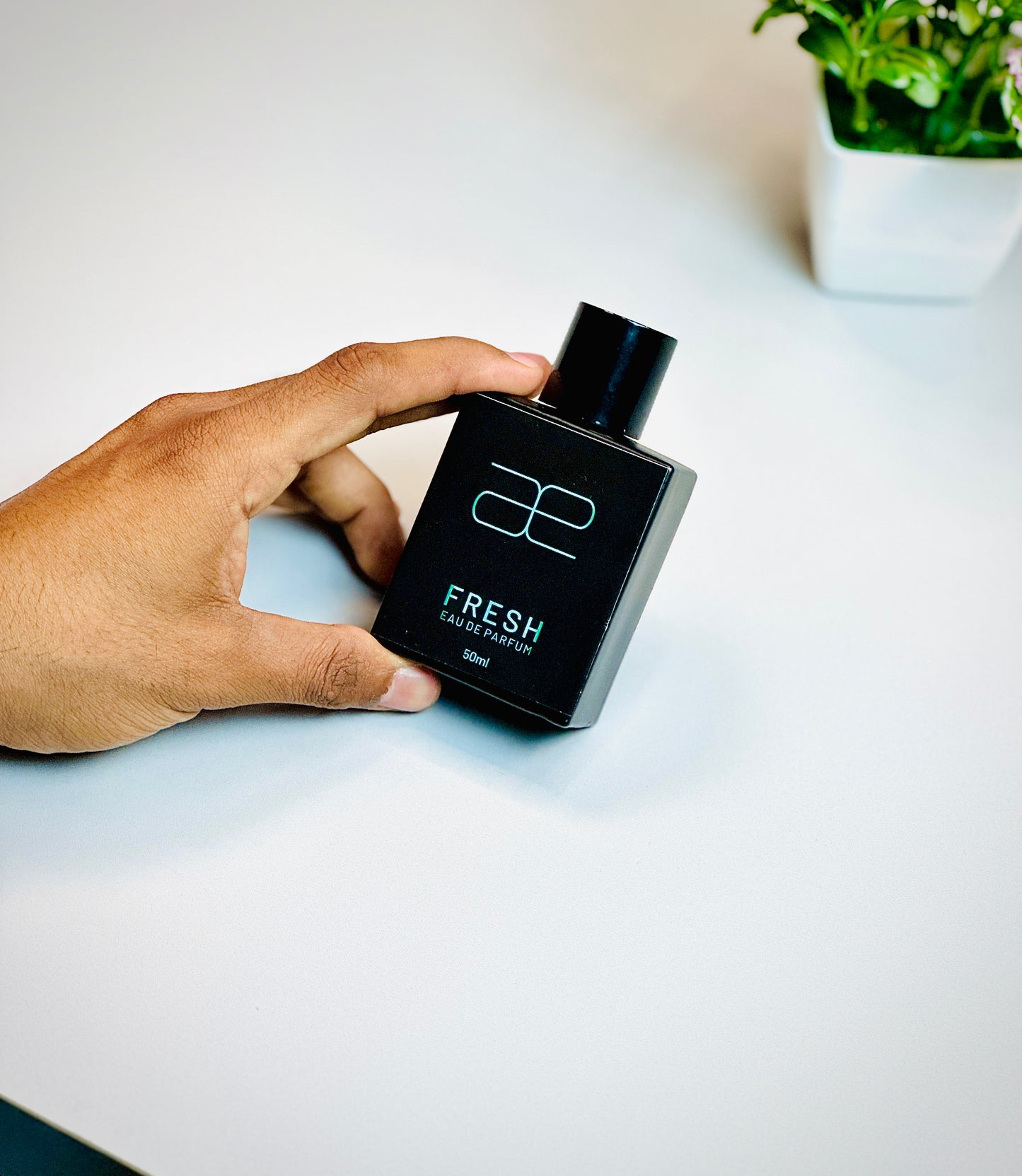 Blaek Fresh Perfume: Citrus, florals, and warmth in a stylish bottle.