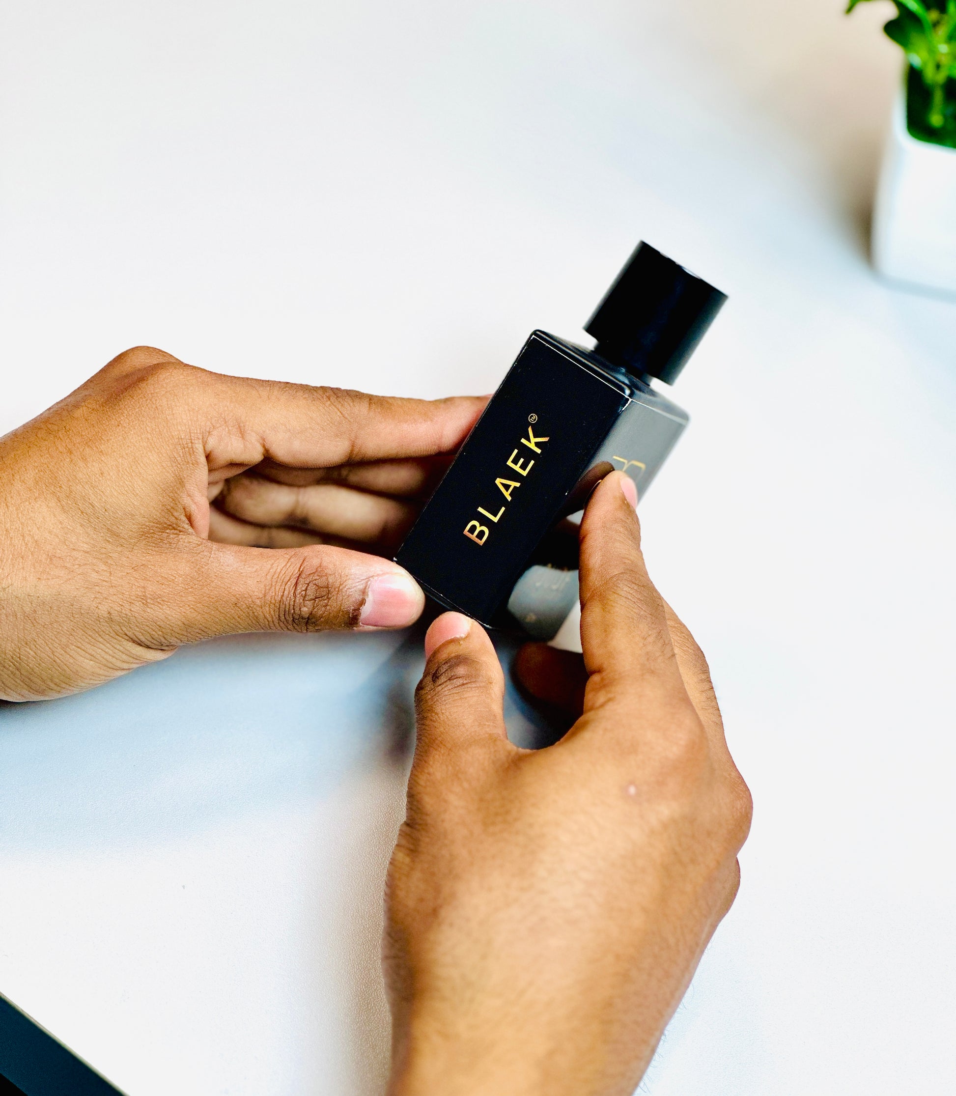 Blaek Oudh Perfume: Sleek bottle capturing the warmth of amber and oud.