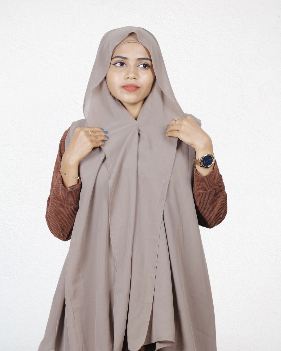 The Dust Storm Slider Mag Hijab has a magnetic closure for quick and easy styling.