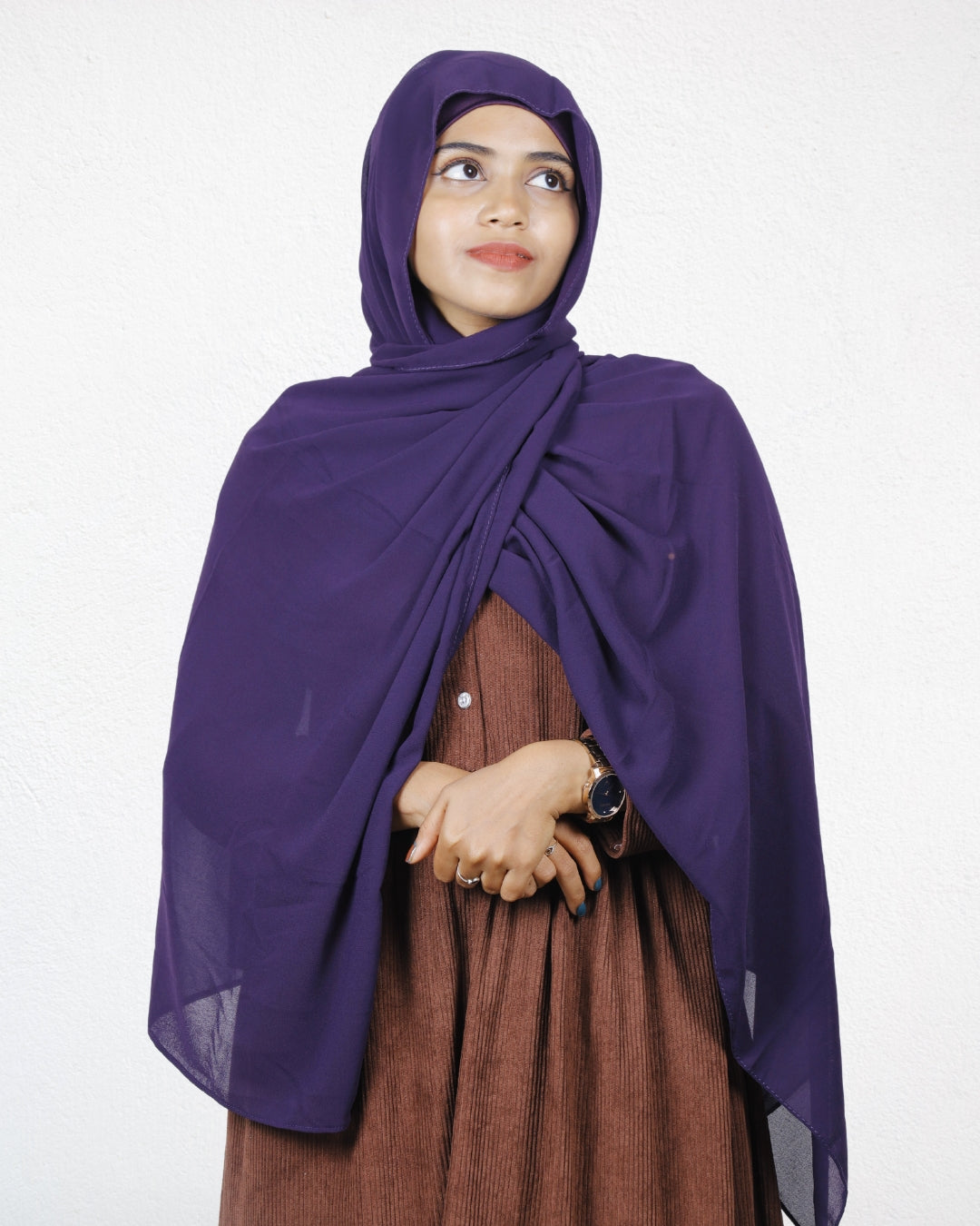 Elegant and vibrant, the eggplant chiffon scarf complements any look with ease.