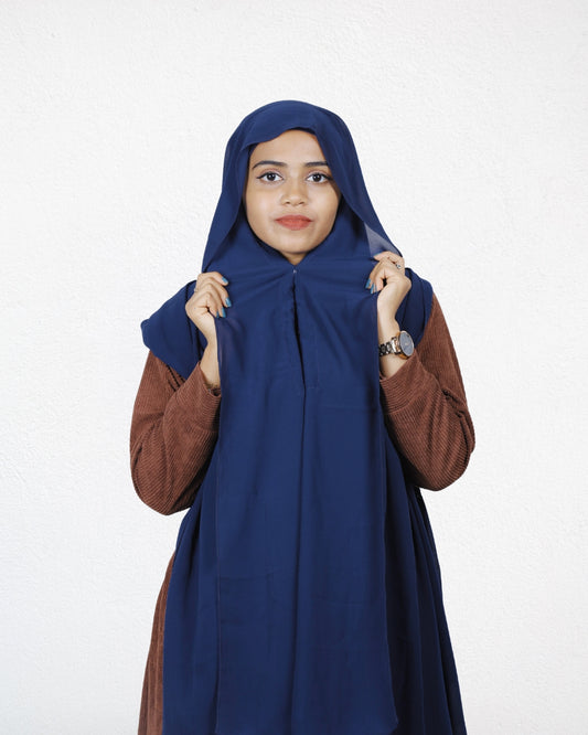 The Navy Blue Slider Mag Hijab features a magnetic closure for quick and easy styling.